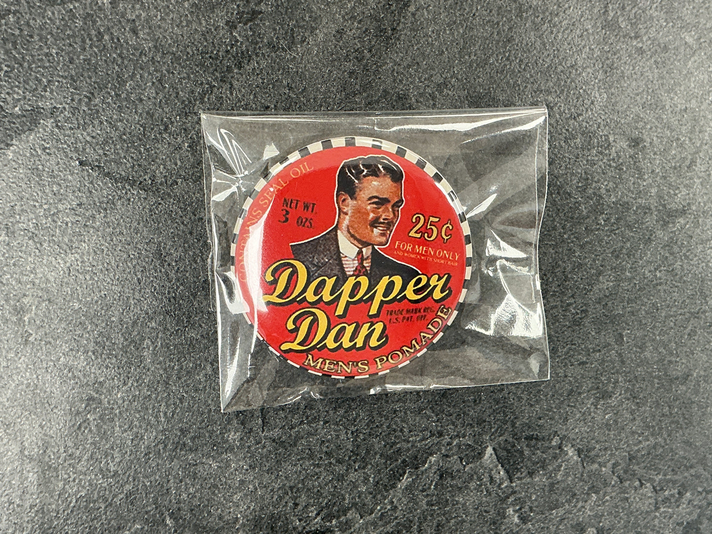 Dapper Dan needleminder